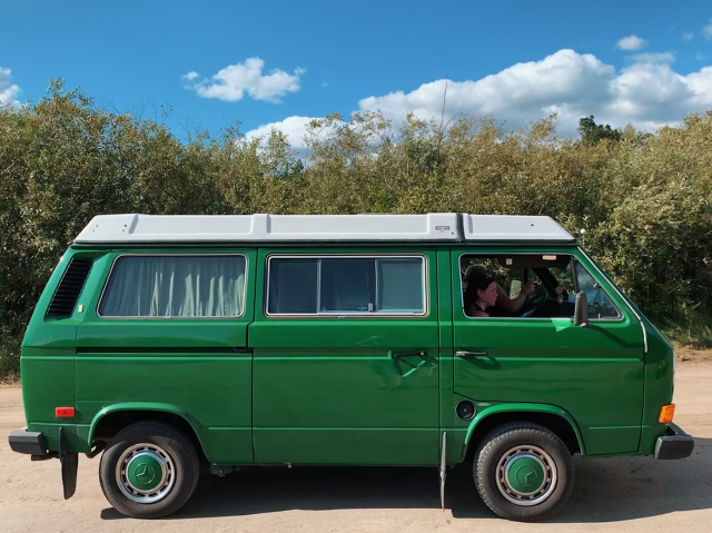 photo of a bright green 80s volkswagon campervan