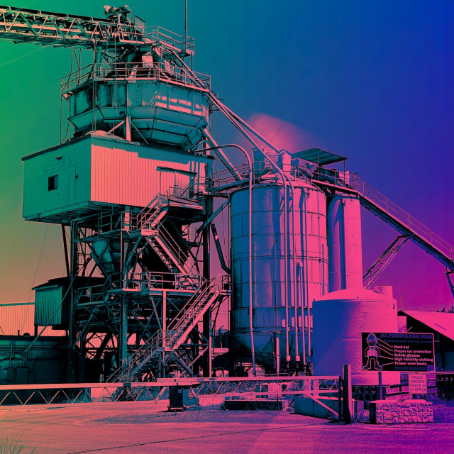 a picture of a factory colorized with gradients